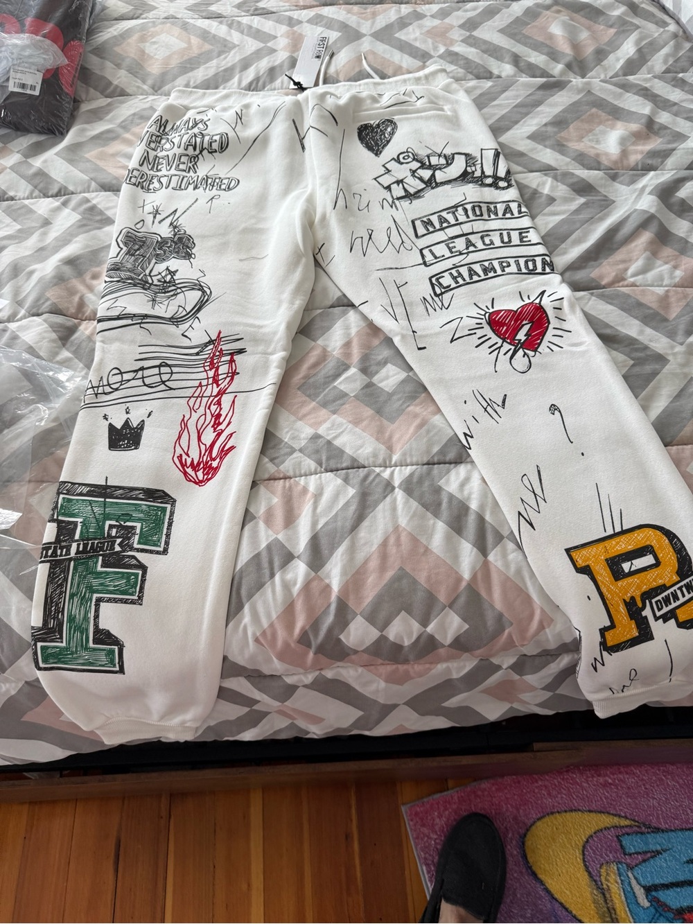 First Row White Graphic Drawstring Sweatpants with Multi-Color Designs - Picture 5 of 5
